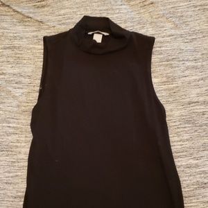 Black sleeveless turtle neck